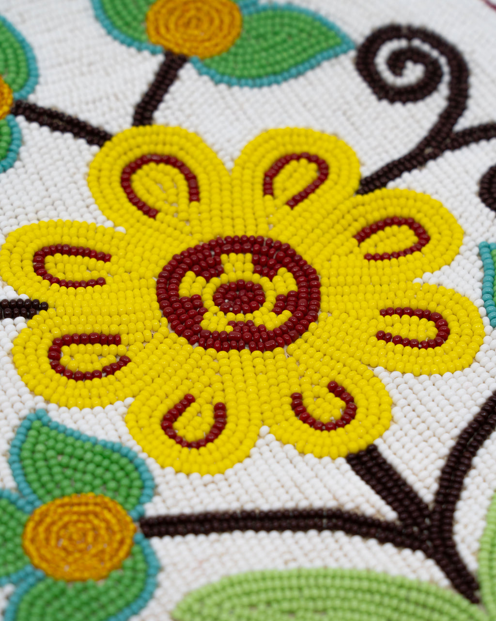 Floral octopus bag in caribou hide and glass beads – Attributed to Elizabeth Jacob, Webequie First Nation