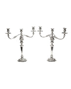 Paire de chandeliers anciens en métal argenté